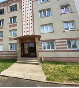 a large building with a door in front of it at La Belle Escale d'Epinay aux portes de Paris in Épinay-sur-Seine +27 photos