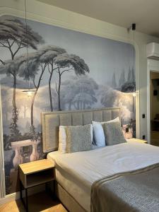 Postel nebo postele na pokoji v ubytování lux-deluxe city apartment