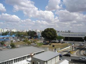 a view of a city with a building and a parking lot at Gran Fortaleza Hotel in Goiânia