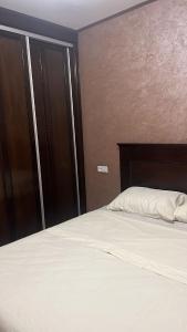 Postel nebo postele na pokoji v ubytování Apartment sunah + 3 fotografie