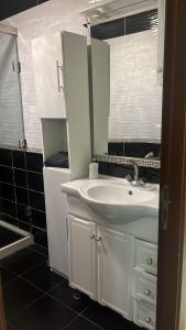 Koupelna v ubytování Apartment sunah