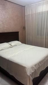 Postel nebo postele na pokoji v ubytování Apartment sunah