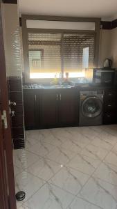 Kuchyň nebo kuchyňský kout v ubytování Apartment sunah