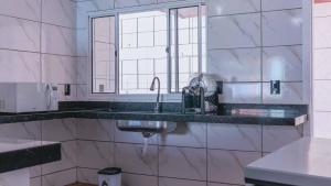 Gambar di galeri bagi Casa Amaral Pet-Friendly com piscina p 10 pessoas di Iturama