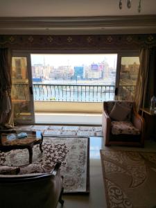 Ruang duduk di أطلالة النيل apartment +25 gambar