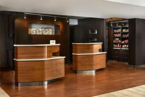 a store with wooden counters in a room at Courtyard by Marriott Boulder in Boulder +28 photos
