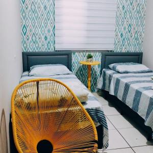 Ένα ή περισσότερα κρεβάτια σε δωμάτιο στο Hostel gru Airport
