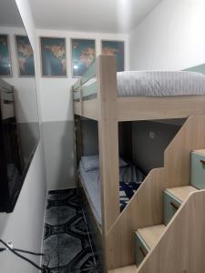 Ένα ή περισσότερα κρεβάτια σε δωμάτιο στο Hostel gru Airport