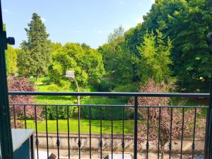 a view of a park from a balcony at Dedè&Mimì Come a casa tua in Vasanello