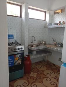 Η κουζίνα ή μικρή κουζίνα στο Airbn b Estancia ALVARADO 1