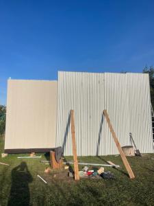 a building is under construction in a yard at Casa Acantilados Suites in Mar del Plata