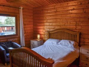 Postel nebo postele na pokoji v ubytování Larch Lodge - Uk37187
