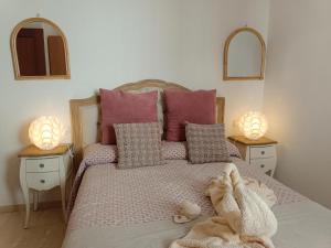 Postel nebo postele na pokoji v ubytování CASA ALFONSO