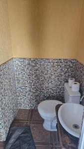 Ένα μπάνιο στο Quarto - suíte baru - Centro Histórico da Cidade de Goiás