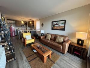 Posezení v ubytování Dpto Mirador Philippi Vista Lago