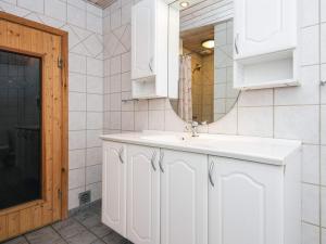 a white bathroom with a sink and a mirror at 12 person holiday home in Nordborg-By Traum in Nordborg +23 photos