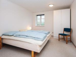 Ένα ή περισσότερα κρεβάτια σε δωμάτιο στο 12 person holiday home in Nordborg-By Traum