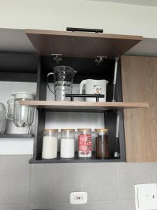 Kuchyň nebo kuchyňský kout v ubytování Apartamento cerca Terminal de Transportes y Cable aéreo