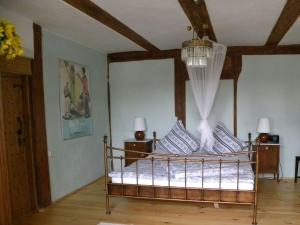 Ένα ή περισσότερα κρεβάτια σε δωμάτιο στο Holiday home in Putzar with swimming pool