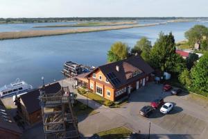 an aerial view of a house next to a river at Studio for 4 people in winouj cie in Świnoujście