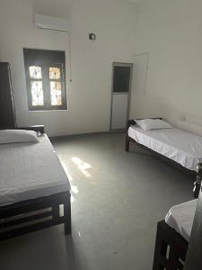 Ένα ή περισσότερα κρεβάτια σε δωμάτιο στο The hostel abay
