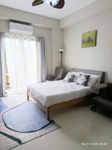 Katil atau katil-katil dalam bilik di Angsana Breeze at Crosswinds