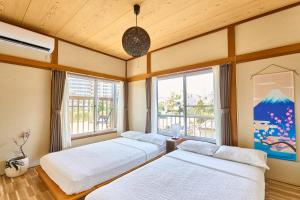 Ένα ή περισσότερα κρεβάτια σε δωμάτιο στο Stay as Local mizue