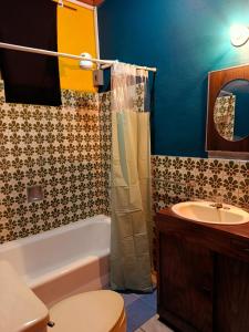 Koupelna v ubytování Expresión cultural restaurante y alojamiento