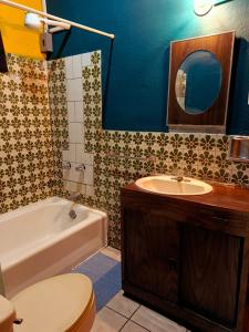 Koupelna v ubytování Expresión cultural restaurante y alojamiento