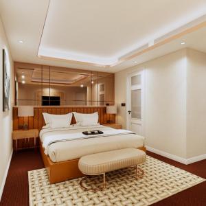 a large bedroom with a large bed and a table at The Haron Hanoi Boutique Hotel in Hanoi +40 photos