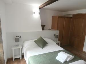 Łóżko lub łóżka w pokoju w obiekcie Pension Via-Stella