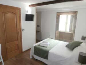Łóżko lub łóżka w pokoju w obiekcie Pension Via-Stella