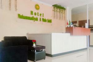 Χώρος καθιστικού στο RedDoorz Syariah at Hotel Muhammadiah Padang Panjang