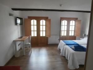 Łóżko lub łóżka w pokoju w obiekcie Pension Via-Stella