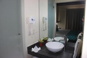 Koupelna v ubytování Orizaba Inn + 37 fotografií