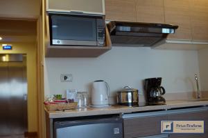 Dapur atau dapur kecil di Atrium Miraflores Hotel
