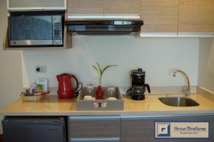 Dapur atau dapur kecil di Atrium Miraflores Hotel