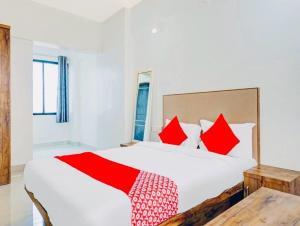 Ένα ή περισσότερα κρεβάτια σε δωμάτιο στο Hotel O Ace Executive