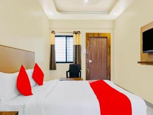 Ένα ή περισσότερα κρεβάτια σε δωμάτιο στο Hotel O Ace Executive