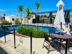 Πισίνα στο ή κοντά στο Auréa Residência - a 500 m da Praia