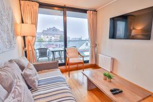 Istumisnurk majutusasutuses HOM I Depto 2D2B en Conjunto frente a la Costanera