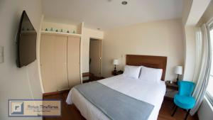 Katil atau katil-katil dalam bilik di Atrium Miraflores Hotel
