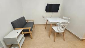 TV a/nebo společenská místnost v ubytování Apartamento para 2 personas en Jaén