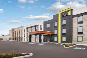 una representación del frente de un hotel en Home2 Suites By Hilton Kitchener, en Kitchener