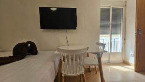 Μια τηλεόραση ή/και κέντρο ψυχαγωγίας στο Estudio para pareja en Jaén