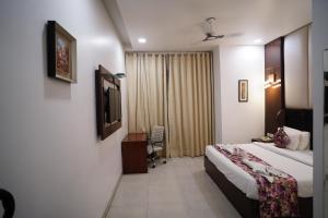 Postel nebo postele na pokoji v ubytování Hotel Royal Imperio + 46 fotografií