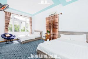 Ένα ή περισσότερα κρεβάτια σε δωμάτιο στο Villa Hồ Bơi Đồi Ngọc Tước Bãi Sau BiDa - karaoke +34 φωτογραφίες