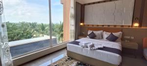 Ένα ή περισσότερα κρεβάτια σε δωμάτιο στο Montecarlo Hotel +120 φωτογραφίες