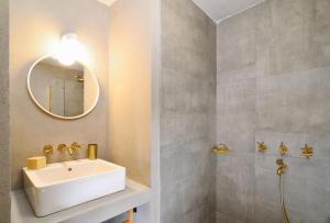 a bathroom with a sink and a mirror at OLO Bodrum Hotel Yalıkavak 8 min Gumusluk 3 min in Bodrum City +48 photos