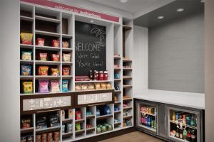 a store with a large shelf of food at Hampton Inn & Suites Walterboro in Walterboro
